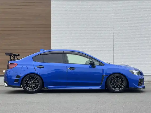 スバル ＷＲＸ ＳＴＩ STI 秋田県 2014(平26)年 4.1万km WRブルーパール 6速MT/４WD/ターボ/STI製ドライカーボンリヤスポイラー/STI製アルミホイール/フルエアロ/ローダウン（TEIN製）/純正サスペンション積込/スマートキー/ETC/プッシュスタート/純正フロアマット/純正ドアバイザー/パワーステアリング/パワーウィンドウ/オートエアコン/オートライト/電動格納ウィンカーミラー/保証書/取扱説明書/記録簿