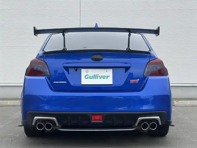 スバル ＷＲＸ ＳＴＩ STI 秋田県 2014(平26)年 4.1万km WRブルーパール 6速MT/４WD/ターボ/STI製ドライカーボンリヤスポイラー/STI製アルミホイール/フルエアロ/ローダウン（TEIN製）/純正サスペンション積込/スマートキー/ETC/プッシュスタート/純正フロアマット/純正ドアバイザー/パワーステアリング/パワーウィンドウ/オートエアコン/オートライト/電動格納ウィンカーミラー/保証書/取扱説明書/記録簿