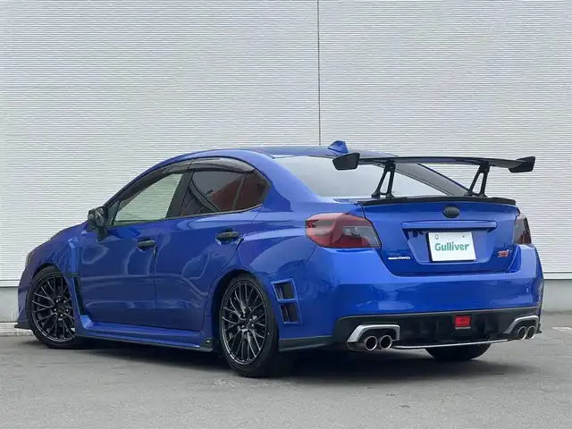 スバル ＷＲＸ ＳＴＩ STI 秋田県 2014(平26)年 4.1万km WRブルーパール 6速MT/４WD/ターボ/STI製ドライカーボンリヤスポイラー/STI製アルミホイール/フルエアロ/ローダウン（TEIN製）/純正サスペンション積込/スマートキー/ETC/プッシュスタート/純正フロアマット/純正ドアバイザー/パワーステアリング/パワーウィンドウ/オートエアコン/オートライト/電動格納ウィンカーミラー/保証書/取扱説明書/記録簿