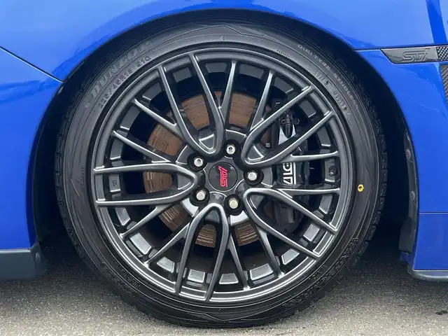 スバル ＷＲＸ ＳＴＩ STI 秋田県 2014(平26)年 4.1万km WRブルーパール 6速MT/４WD/ターボ/STI製ドライカーボンリヤスポイラー/STI製アルミホイール/フルエアロ/ローダウン（TEIN製）/純正サスペンション積込/スマートキー/ETC/プッシュスタート/純正フロアマット/純正ドアバイザー/パワーステアリング/パワーウィンドウ/オートエアコン/オートライト/電動格納ウィンカーミラー/保証書/取扱説明書/記録簿