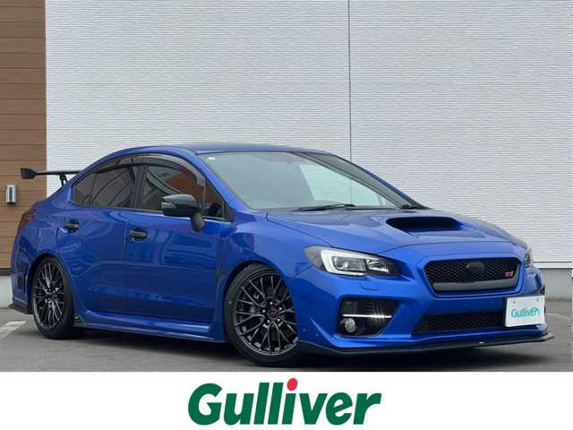 スバル ＷＲＸ ＳＴＩ STI 秋田県 2014(平26)年 4.1万km WRブルーパール 6速MT/４WD/ターボ/STI製ドライカーボンリヤスポイラー/STI製アルミホイール/フルエアロ/ローダウン（TEIN製）/純正サスペンション積込/スマートキー/ETC/プッシュスタート/純正フロアマット/純正ドアバイザー/パワーステアリング/パワーウィンドウ/オートエアコン/オートライト/電動格納ウィンカーミラー/保証書/取扱説明書/記録簿