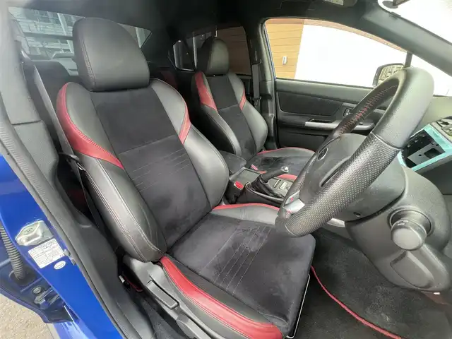 スバル ＷＲＸ ＳＴＩ STI 秋田県 2014(平26)年 4.1万km WRブルーパール 6速MT/４WD/ターボ/STI製ドライカーボンリヤスポイラー/STI製アルミホイール/フルエアロ/ローダウン（TEIN製）/純正サスペンション積込/スマートキー/ETC/プッシュスタート/純正フロアマット/純正ドアバイザー/パワーステアリング/パワーウィンドウ/オートエアコン/オートライト/電動格納ウィンカーミラー/保証書/取扱説明書/記録簿