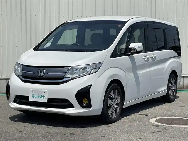 ホンダ ステップワゴン G EX 富山県 2016(平28)年 6.1万km ホワイトオーキッドパール ワンオーナー/アルパイン10型ナビ(BT/CD/DVD)/フルセグTV/パワースライドドア(両側)/バックカメラ/ビルトインETC/コムテックドライブレコーダー/アルパイン12.8型リアビジョン/アダプティブクルーズコントロール/ホンダセンシング/・オートライト/・衝突軽減ブレーキ/・車線維持支援システム/・誤発進抑制機能/・先行車発進お知らせ機能/・標識認識機能/デュアルオートエアコン/ステアリングスイッチ/ツイード調ジャージシート/前席シートヒーター/2列目キャプテンシート/わくわくゲート/純正16インチアルミホイール/スマートキーシステム/セキュリティアラーム/禁煙車