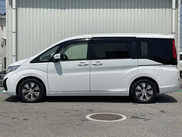 ホンダ ステップワゴン G EX 富山県 2016(平28)年 6.1万km ホワイトオーキッドパール ワンオーナー/アルパイン10型ナビ(BT/CD/DVD)/フルセグTV/パワースライドドア(両側)/バックカメラ/ビルトインETC/コムテックドライブレコーダー/アルパイン12.8型リアビジョン/アダプティブクルーズコントロール/ホンダセンシング/・オートライト/・衝突軽減ブレーキ/・車線維持支援システム/・誤発進抑制機能/・先行車発進お知らせ機能/・標識認識機能/デュアルオートエアコン/ステアリングスイッチ/ツイード調ジャージシート/前席シートヒーター/2列目キャプテンシート/わくわくゲート/純正16インチアルミホイール/スマートキーシステム/セキュリティアラーム/禁煙車