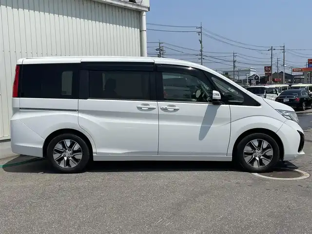 ホンダ ステップワゴン G EX 富山県 2016(平28)年 6.1万km ホワイトオーキッドパール ワンオーナー/アルパイン10型ナビ(BT/CD/DVD)/フルセグTV/パワースライドドア(両側)/バックカメラ/ビルトインETC/コムテックドライブレコーダー/アルパイン12.8型リアビジョン/アダプティブクルーズコントロール/ホンダセンシング/・オートライト/・衝突軽減ブレーキ/・車線維持支援システム/・誤発進抑制機能/・先行車発進お知らせ機能/・標識認識機能/デュアルオートエアコン/ステアリングスイッチ/ツイード調ジャージシート/前席シートヒーター/2列目キャプテンシート/わくわくゲート/純正16インチアルミホイール/スマートキーシステム/セキュリティアラーム/禁煙車