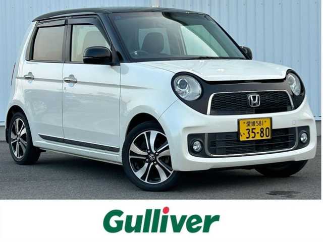 ホンダ Ｎ ＯＮＥ プレミアム ツアラー Lパッケージ 愛媛県 2013(平25)年 9.4万km プレミアムホワイトパール パドルシフト/社外ナビ/オートライト/LED/フォグランプ/クルーズコントロール/ETC/Bカメラ/ワンセグTV/DVD再生可能/ベンチシート/純正フロアマット/純正１５AW/横滑り防止装置/スマートキー/プッシュスタート/Bluetooth/カーテンエアバッグ