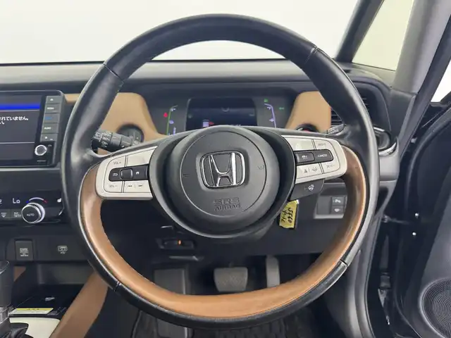 ホンダ フィット e:HEVリュクス 愛知県 2020(令2)年 4.2万km クリスタルブラックパール 純正9型ナビ（フルセグ、CD、DVD、Bluetooth）/ETC/Bカメラ/シートヒーター/ハンドルヒーター/コーナーセンサー/オートハイビーム/LEDヘッドライト/ドラレコ前後/置くだけ充電/ACC/純正16インチAW/衝突軽減ブレーキ/レーンキープアシスト/オートハイビーム/三点エアバック/横滑り防止装置/スマートキー