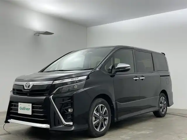 トヨタ ヴォクシー ZS 煌Ⅲ 岡山県 2021(令3)年 4.3万km ブラック アルパイン12.8インチフリップダウンモニター	/アルパインビックX11インチナビ/【ナビ/フルセグ/Bluetooth/DVD/Carplay】	/バックカメラ(サイド付)/クルーズコントロール/オートハイビーム	/LEDヘッドライト（AUTO機能付き）	/ビルトインETC	/衝突軽減ブレーキシステム	/車線逸脱防止システム	/横滑り防止装置/踏み間違い防止装置	/純正ドライブレコーダー（前後）	/純正16インチアルミ	/コーナーセンサー（前後）	/社外フロアマット/ステアリングスイッチ		/プッシュスタート	/ISOFIX/後席サンシェイド/シートリフター/シートバックテーブル/ウィンカーミラー