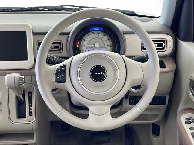 スズキ ラパン X 秋田県 2024(令6)年 0.1千km アーバンブラウンパールメタリック 4WD/スズキセーフティサポート/ステアリングスイッチ/革巻きハンドル/前席シートヒーター/プッシュスタート/電動格納ミラー/純正アルミホイール/LEDヘッドライト/オートライト/コーナーセンサー/スマートキー