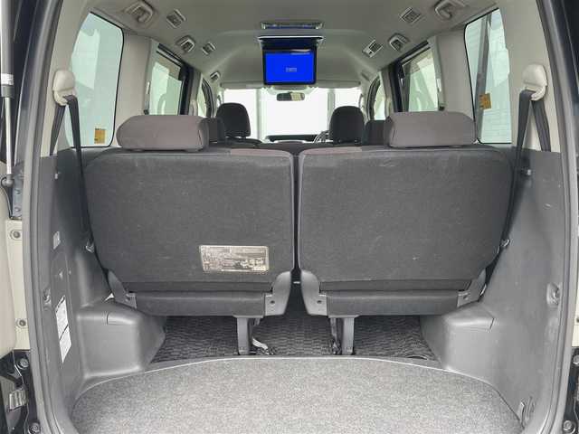 トヨタ ヴォクシー ZS 煌Ⅱ 大阪府 2009(平21)年 10.5万km ブラック LEDヘッドランプ/ハロゲンフォグランプ/バックカメラ /HDDナビ /両側電動パワースライドドア　/ミュージックプレーヤー　/オートライト　/純正マット　/ビルトインETC　/CD/DVD再生機能有り　/フルセグテレビ　/Bluetooth　/後席モニター/プッシュスタート