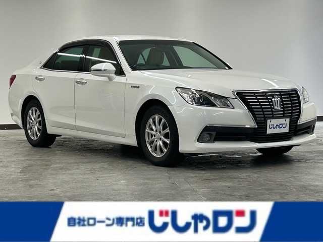 トヨタ クラウン ハイブリッド ロイヤルサルーン 静岡県 2014(平26)年 13.9万km ホワイトパールクリスタルシャイン (株)IDOMが運営する【じしゃロン浜松店】の自社ローン専用車両になりますこちらは現金またはオートローンご利用時の価格です。自社ローンご希望の方は別途その旨お申付け下さい/純正ナビ/Ｂｌｕｅｔｏｏｔｈ/CD/CD/DVD/USB/フルセグTV/パワーシート/シートヒーター/クルーズコントロール/ＭＴモード付ＡＴ/ＥＴＣ/横滑り防止装置/盗難防止装置/バックカメラ/オートライト/プッシュスタート