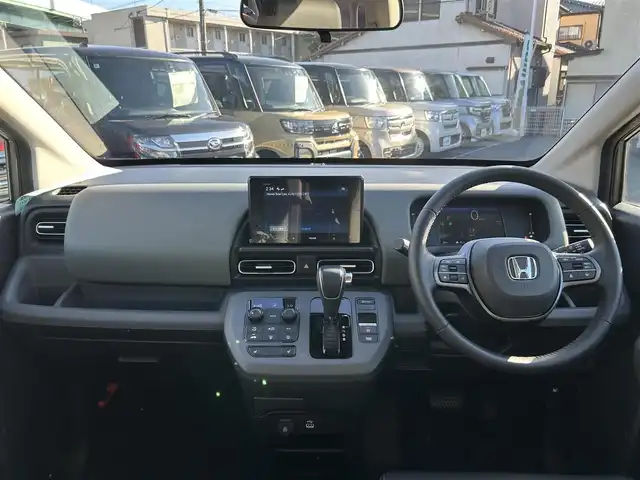 ホンダ フリード ハイブリット e:HEV クロスター 愛知県 2025(令7)年 0.5万km ベージュ 〇ギャザーズディスプレイオーディオ/〇両側パワースライドドア/〇バックカメラ/〇アダプティブクルーズコントロール/〇ホンダセンシング/〇ブラインドスポットインフォメーション/〇オートハイビーム/〇LEDヘッドランプ/〇LEDフロントフォグランプ/〇革巻きシフトノブ/〇革巻きステアリングホイール/〇合皮/撥水ファブリックコンビシート/〇シートヒーター/〇純正15インチアルミホイール/〇スマートキーシステム/〇スペアスマートキー/〇禁煙車