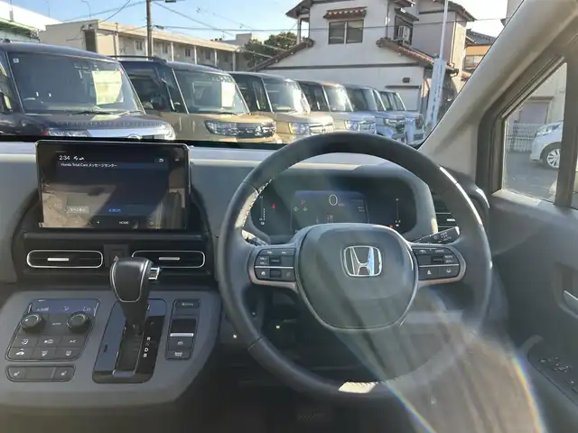 ホンダ フリード ハイブリット e:HEV クロスター 愛知県 2025(令7)年 0.5万km ベージュ 〇ギャザーズディスプレイオーディオ/〇両側パワースライドドア/〇バックカメラ/〇アダプティブクルーズコントロール/〇ホンダセンシング/〇ブラインドスポットインフォメーション/〇オートハイビーム/〇LEDヘッドランプ/〇LEDフロントフォグランプ/〇革巻きシフトノブ/〇革巻きステアリングホイール/〇合皮/撥水ファブリックコンビシート/〇シートヒーター/〇純正15インチアルミホイール/〇スマートキーシステム/〇スペアスマートキー/〇禁煙車