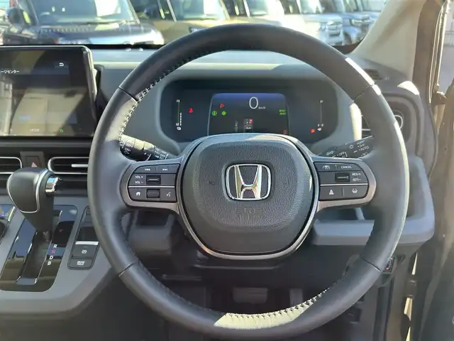 ホンダ フリード ハイブリット e:HEV クロスター 愛知県 2025(令7)年 0.5万km ベージュ 〇ギャザーズディスプレイオーディオ/〇両側パワースライドドア/〇バックカメラ/〇アダプティブクルーズコントロール/〇ホンダセンシング/〇ブラインドスポットインフォメーション/〇オートハイビーム/〇LEDヘッドランプ/〇LEDフロントフォグランプ/〇革巻きシフトノブ/〇革巻きステアリングホイール/〇合皮/撥水ファブリックコンビシート/〇シートヒーター/〇純正15インチアルミホイール/〇スマートキーシステム/〇スペアスマートキー/〇禁煙車