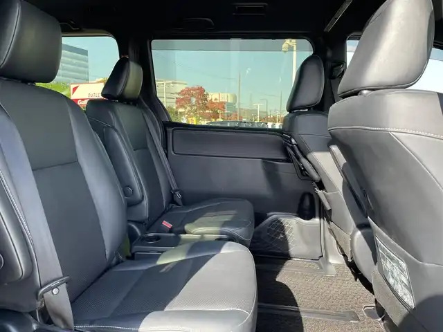 トヨタ エスクァイア ハイブリッド Gi 大阪府 2018(平30)年 4.1万km ブラック 純正9インチナビ/・BT/フルセグTV//純正12インチフリップダウンモニター/バックカメラ/トヨタセーフティセンス/両側パワースライドドア/クルーズコントロール/ビルトインETC2.0/黒レザーシート/シートヒーター/純正フロアマット/純正15インチAW/LEDヘッド・フォグ/取説