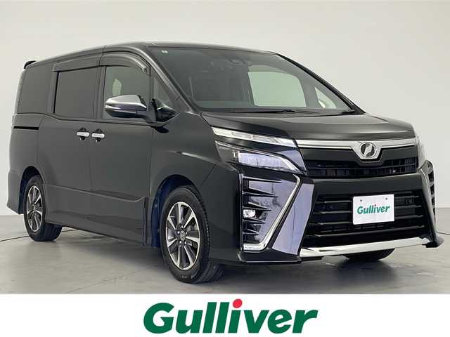 トヨタ ヴォクシー ZS 煌Ⅱ 岐阜県 2019(令1)年 8.6万km ブラック 純正ナビ/BT/フルセグ/CD/DVD/USB/HDMI/SD/衝突被害軽減システム/クルーズコントロール/レーンキープアシスト/オートハイビーム/バックカメラ/MTモード付MT/フォグランプ/LEDヘッドライト/ETC/両側パワースライドドア/スマートキー/プッシュスタート/スペアキー/革ステアリング/ステアリングスイッチ/純正フロアマット/純正アルミホイール/純正ドアバイザー