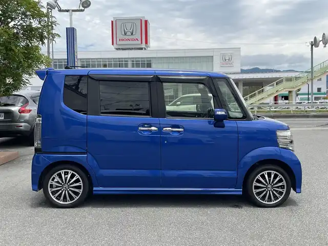 ホンダ Ｎ ＢＯＸ G ターボ Lパッケージ 山梨県 2016(平28)年 8.2万km ブリリアントスポーティブルーメタリック2トーン (株)IDOMが運営する【じしゃロン甲府店】の自社ローン専用車両になります。/こちらは現金またはオートローンご利用時の価格です。自社ローンご希望の方は別途その旨お申付け下さい/スマートキー２個/両側パワースライドドア/クルーズコントロール/パドルシフト/社外メモリーナビ・フルセグTV/CD・DVD・BTオーディオ/ビルトインETC/HIDオートライト/保証書・取説書