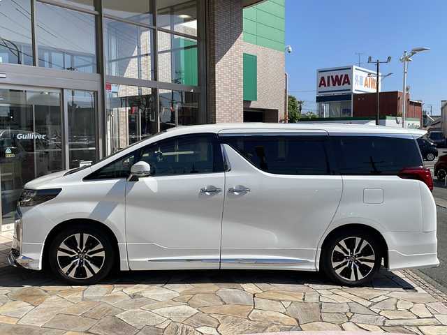 トヨタ アルファード S Cパッケージ 静岡県 2019(平31)年 4.7万km ホワイトパールクリスタルシャイン 【主要装備】/メーカーOPナビ　/JBLプレミアムサウンド　/モデリスタフルエアロ　/サンルーフ　/後席フリップダウンモニター　/アラウンドビューモニター　/3眼LEDヘッドライト　/LEDフォグ/両側パワースライドドア　/レーダークルーズコントロール/ステアリングスイッチ/ステアリングヒーター/前席シートヒーター＆ベンチレーション/前席パワーシート/後席パワーシート＆オットマン/純正18インチアルミホイール/プリクラッシュセーフティ/オートライト/オートマチックハイビーム/デジタルインナーミラー/ETC