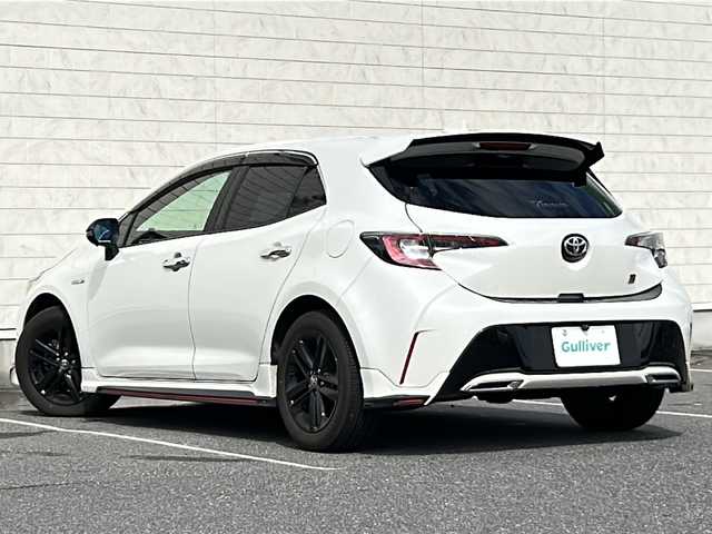 トヨタ カローラ スポーツ ハイブリッドG Z 茨城県 2019(令1)年 7.8万km ホワイトパールクリスタルシャイン フロントモデリスタエアロ/TRDサイドスカート/ブリッツリアスポイラー/社外9inナビ【MDV-M906HDL】/(地デジTV・CD・DVD・BT・ラジオ再生)/レーダークルーズコントロール/レーンアシスト/プリクラッシュセーフティ/コーナーセンサー/ドライブレコーダー/ビルトインETC/バックカメラ/純正16inアルミホイール/ウッドコンビステアリング/フロアマット/スマートキー