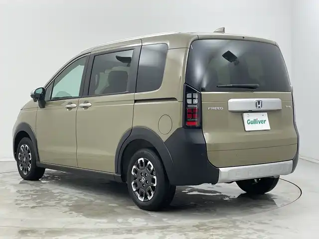 ホンダ フリード ハイブリット e:HEV クロスター 新潟県 2025(令7)年 0.1千km ベージュ 4WD/9インチ純正メモリナビ【LXM-242ZFNI】/フルセグTV/Bluetooth/AppleCarPlay/AndroidAuto/ホンダセンシング/・衝突被害軽減ブレーキ/・先行車発進お知らせ機能/・歩行者事故低減ステアリング/・路外逸脱抑制機能/・標識認識機能/・渋滞追従機能付アダプティブクルーズコントロール/・車線維持支援システム/・トラフィックジャムアシスト(渋滞運転支援機能)/・ブラインドスポットインフォメーション/・誤発進抑制機能/・後方誤発進抑制機能/・近距離衝突軽減ブレーキ/・急アクセル抑制機能/・パーキングセンサーシステム/・オートマチックハイビーム/ハーフレザーシート/前席シートヒーター/両側パワースライドドア/前後コーナーセンサー/バックモニター/LEDヘッドライト/横滑り防止装置