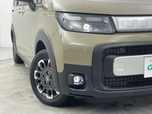 ホンダ フリード ハイブリット e:HEV クロスター 新潟県 2025(令7)年 0.1千km ベージュ 4WD/9インチ純正メモリナビ【LXM-242ZFNI】/フルセグTV/Bluetooth/AppleCarPlay/AndroidAuto/ホンダセンシング/・衝突被害軽減ブレーキ/・先行車発進お知らせ機能/・歩行者事故低減ステアリング/・路外逸脱抑制機能/・標識認識機能/・渋滞追従機能付アダプティブクルーズコントロール/・車線維持支援システム/・トラフィックジャムアシスト(渋滞運転支援機能)/・ブラインドスポットインフォメーション/・誤発進抑制機能/・後方誤発進抑制機能/・近距離衝突軽減ブレーキ/・急アクセル抑制機能/・パーキングセンサーシステム/・オートマチックハイビーム/ハーフレザーシート/前席シートヒーター/両側パワースライドドア/前後コーナーセンサー/バックモニター/LEDヘッドライト/横滑り防止装置