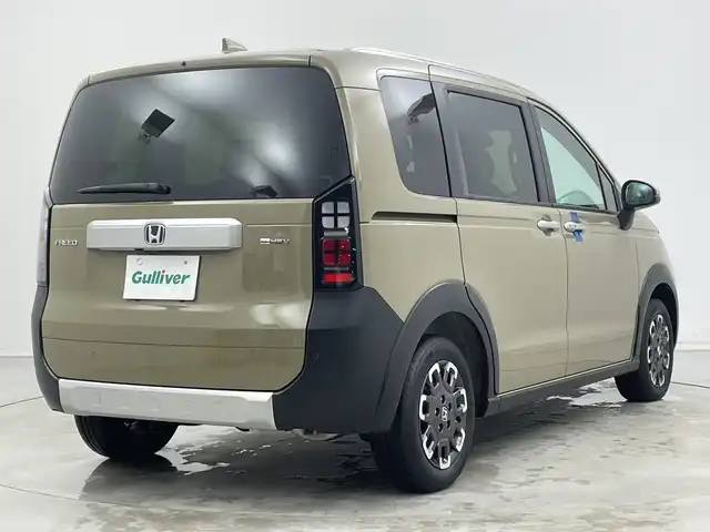 ホンダ フリード ハイブリット e:HEV クロスター 新潟県 2025(令7)年 0.1千km ベージュ 4WD/9インチ純正メモリナビ【LXM-242ZFNI】/フルセグTV/Bluetooth/AppleCarPlay/AndroidAuto/ホンダセンシング/・衝突被害軽減ブレーキ/・先行車発進お知らせ機能/・歩行者事故低減ステアリング/・路外逸脱抑制機能/・標識認識機能/・渋滞追従機能付アダプティブクルーズコントロール/・車線維持支援システム/・トラフィックジャムアシスト(渋滞運転支援機能)/・ブラインドスポットインフォメーション/・誤発進抑制機能/・後方誤発進抑制機能/・近距離衝突軽減ブレーキ/・急アクセル抑制機能/・パーキングセンサーシステム/・オートマチックハイビーム/ハーフレザーシート/前席シートヒーター/両側パワースライドドア/前後コーナーセンサー/バックモニター/LEDヘッドライト/横滑り防止装置