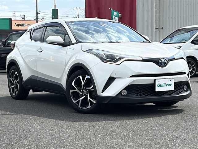 トヨタ Ｃ－ＨＲ G 茨城県 2018(平30)年 6.7万km ホワイトパールクリスタルシャイン 純正９インチメモリナビ【NSZT-Y66T】/(地デジTV・CD・DVD・BT・ラジオ再生)/レーダークルーズコントロール/レーンアシスト/衝突軽減ブレーキ/コーナーセンサー/ブラインドスポットモニター/ハーフレザーシート/シートヒーター/ドライブレコーダー/バックカメラ/ETC/オートライト/LEDヘッドライト/純正18inアルミホイール/フロアマット/スマートキー