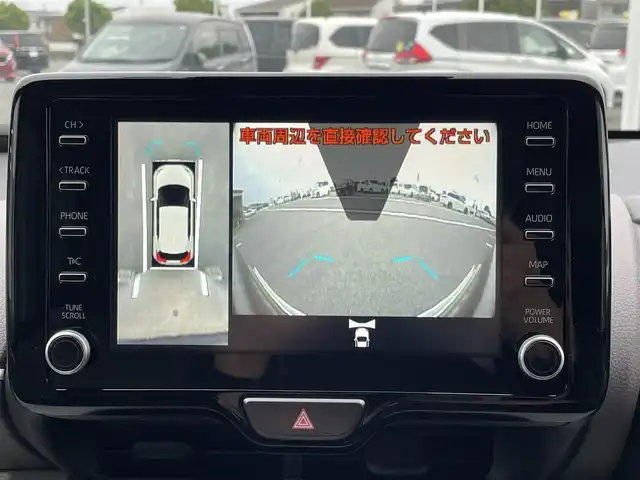 トヨタ ヤリス ハイブリッド Z 群馬県 2023(令5)年 1万km プラチナホワイトパールマイカ トヨタセーフティセンス/・プリクラッシュセーフティ/・レーンディパーチャーアラート/・ブラインドスポットモニター/・クリアランスソナー/・リヤクロストラフィックアラート/・パーキングサポートブレーキ/・ロードサインアシスト/純正ナビ付ディスプレイオーディオ/　（CD DVD Bluetooth USB AM FM)/全方位カメラ/ETC2.0/純正ドライブレコーダー/LEDヘッドライト/オートライト/オートマチックハイビーム/ステアリングリモコン/ステアリングヒーター/前席シートヒーター/取扱説明書/保証書/スペアキー