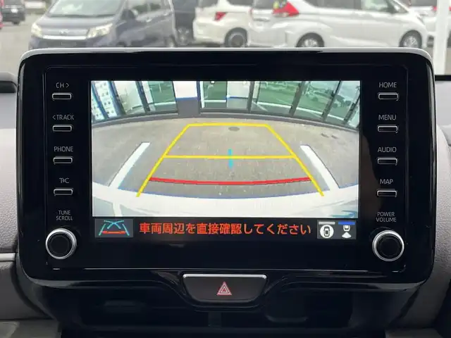 トヨタ ヤリス ハイブリッド Z 群馬県 2023(令5)年 1万km プラチナホワイトパールマイカ トヨタセーフティセンス/・プリクラッシュセーフティ/・レーンディパーチャーアラート/・ブラインドスポットモニター/・クリアランスソナー/・リヤクロストラフィックアラート/・パーキングサポートブレーキ/・ロードサインアシスト/純正ナビ付ディスプレイオーディオ/　（CD DVD Bluetooth USB AM FM)/全方位カメラ/ETC2.0/純正ドライブレコーダー/LEDヘッドライト/オートライト/オートマチックハイビーム/ステアリングリモコン/ステアリングヒーター/前席シートヒーター/取扱説明書/保証書/スペアキー