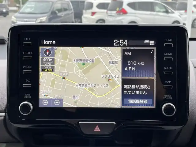 トヨタ ヤリス ハイブリッド Z 群馬県 2023(令5)年 1万km プラチナホワイトパールマイカ トヨタセーフティセンス/・プリクラッシュセーフティ/・レーンディパーチャーアラート/・ブラインドスポットモニター/・クリアランスソナー/・リヤクロストラフィックアラート/・パーキングサポートブレーキ/・ロードサインアシスト/純正ナビ付ディスプレイオーディオ/　（CD DVD Bluetooth USB AM FM)/全方位カメラ/ETC2.0/純正ドライブレコーダー/LEDヘッドライト/オートライト/オートマチックハイビーム/ステアリングリモコン/ステアリングヒーター/前席シートヒーター/取扱説明書/保証書/スペアキー