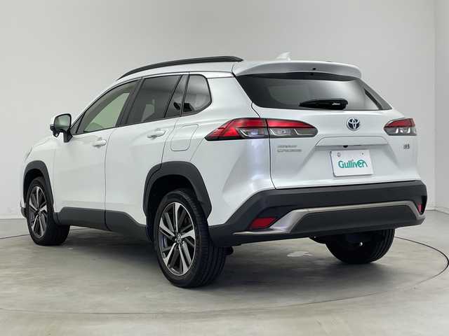 トヨタ カローラ クロス ハイブリッド Z 新潟県 2021(令3)年 2万km プラチナホワイトパールマイカ プリクラッシュセーフティ/レーダークルーズコントロール/レーンキープアシスト/純正9インチディスプレイオーディオ(ナビ機能付き)/フルセグTV/ビルトインETC/ドライブレコーダー/オートLEDヘッドライト/オートハイビーム/純正18インチAW/パワーバックドア/ハーフレザーシート/D席パワーシート/D席・N席シートヒーター/ルーフレール/オートドアミラー