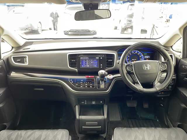 ホンダ オデッセイ ハイブリッド アブソルート・EXホンダセンジング 兵庫県 2018(平30)年 3.1万km プレミアムヴィーナスブラックP ・純正ナビ/CD/DVD/Bluetooth/TV/・マルチビューカメラシステム/・ビルトインETC2.0/・純正フリップダウンモニター/・Honda　SENSING/衝突軽減ブレーキ/誤発進抑制機能/歩行者事故低減ステアリング/路外逸脱抑制機能/アダプティブ・クルーズ・コントロール/車線維持支援システム/先行車発進お知らせ機能/標識認識機能/・ブラインドスポットモニター/・ハーフレザー/・前席シートヒーター/・ステアリングスイッチ/・社外１９インチアルミホイール/・ＬＥＤヘッドライト/・フォグランプ/・オートライト/・プッシュスタート/・スマートキー/・電子パーキング/・オートホールド/・ミラーヒーター/・フロアマット/・2列目サンシェード