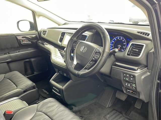 ホンダ オデッセイ ハイブリッド アブソルート・EXホンダセンジング 兵庫県 2018(平30)年 3.1万km プレミアムヴィーナスブラックP ・純正ナビ/CD/DVD/Bluetooth/TV/・マルチビューカメラシステム/・ビルトインETC2.0/・純正フリップダウンモニター/・Honda　SENSING/衝突軽減ブレーキ/誤発進抑制機能/歩行者事故低減ステアリング/路外逸脱抑制機能/アダプティブ・クルーズ・コントロール/車線維持支援システム/先行車発進お知らせ機能/標識認識機能/・ブラインドスポットモニター/・ハーフレザー/・前席シートヒーター/・ステアリングスイッチ/・社外１９インチアルミホイール/・ＬＥＤヘッドライト/・フォグランプ/・オートライト/・プッシュスタート/・スマートキー/・電子パーキング/・オートホールド/・ミラーヒーター/・フロアマット/・2列目サンシェード