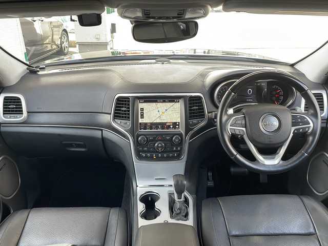 クライスラー・ジープ ジープ グランドチェロキー サミット 愛媛県 2018(平30)年 3.2万km 黒 純正ナビ/サンルーフ/バックカメラ/純正フロアマット/純正アルミホイール/TV/電動パワーシート/シートヒーター/エアシート/ETC/電動リアゲート/追従型クルーズコントロール/ステアリングヒーター/harman kardon サウンド/ドライブレコーダー/衝突被害軽減システム/レーンキープアシスト/ダウンヒルアシストコントロール