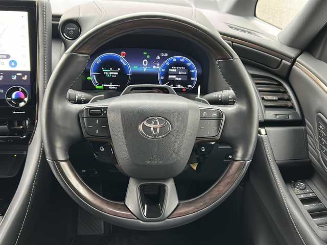 トヨタ ヴェルファイア ハイブリット Z プレミア 山口県 2024(令6)年 3.3万km ブラック 左右独立ムーンルーフ/純正13インチ有機ELフリップダウンモニター/14インチディスプレイオーディオ（コネクティッドナビ対応）Plus/・フルセグテレビ/・Bluetooth/・AM/FM/・USB/・Miracast/・Apple CarPlay/・Android Auto/パノラミックビューモニター/両側パワースライドドア/パワーバックドア/ETC2.0/3列シート/レザーパワーシート/エアーシート/デジタルインナーミラー/プッシュスタート/スマートキー（スペアキー有）/バックカメラ/HUD/電動パーキングブレーキ/ドライバーモニターカメラ/後席電動サンシェード/タイプＣ入力端子/タイプＣ充電端子/置くだけ充電/取説/保証書/Toyota Safety Sense/・プリクラッシュセーフティ/・レーントレーシングアシスト/・レーダークルーズコントロール（全車追従機能付）/・ロードサインアシスト/・アダプティブハイビームシステム/・オートマチックハイビーム/安全装備/・先行車発進告知機能/・BSM/・リヤクロストラフィックアラート/・パーキングサポートブレーキ/・クリアランスソナー＆バックソナー/・安心降車アシスト