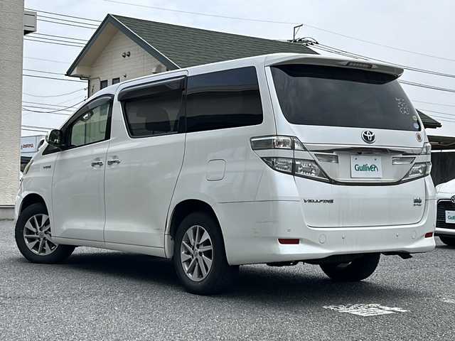 トヨタ ヴェルファイア ハイブリット X 茨城県 2012(平24)年 11.8万km ホワイトパールクリスタルシャイン 社外ナビ　/フルセグTV　/CD/DVD再生　/バックカメラ　/ETC/アルパインフリップダウンモニター　/オットマン　/ウォークスルー/クルーズコントロール/コーナーセンサー/両側パワースライドドア/純正アルミホイール　/社外フロアマット