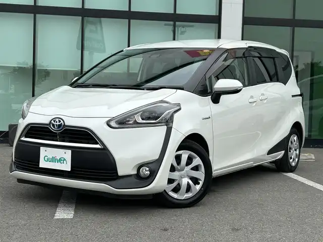 トヨタ シエンタ ハイブリッド G クエロ 和歌山県 2018(平30)年 6.8万km ホワイトパールクリスタルシャイン 車検R9年3月/純正メモリーナビ/（BT/CD/DVD)/フルセグTV/バックカメラ/両側パワースライドドア/トヨタセーフティセンス/・レーンキープアシスト/・プリクラッシュセーフティ/・ハイビームアシスト/純正フロアマット/ウインカー付きドアミラー/ハーフレザーシート/アイドリングストップ/LEDオートヘッドライト/スマートキー×2/ビルトインETC