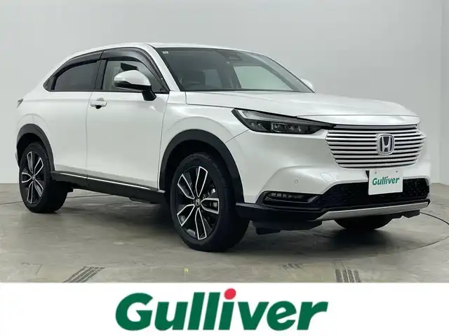 ホンダ ヴェゼル ハイブリッド e:HEV Z 岡山県 2021(令3)年 4.8万km プラチナホワイトパール ホンダコネクトディスプレイ/（Bluetooth/フルセグTV/Carplay/USB）/ハーフレザーシート/衝突軽減ブレーキ/レーダークルーズコントロール/ビルトインＥＴＣ２．０/ＬＥＤヘッドライト/シートヒーター/ステアリングヒーター/バックカメラ/オートハイビーム/置くだけ充電/コーナーセンサー/パドルシフト