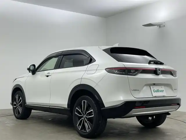 ホンダ ヴェゼル ハイブリッド e:HEV Z 岡山県 2021(令3)年 4.8万km プラチナホワイトパール ホンダコネクトディスプレイ/（Bluetooth/フルセグTV/Carplay/USB）/ハーフレザーシート/衝突軽減ブレーキ/レーダークルーズコントロール/ビルトインＥＴＣ２．０/ＬＥＤヘッドライト/シートヒーター/ステアリングヒーター/バックカメラ/オートハイビーム/置くだけ充電/コーナーセンサー/パドルシフト