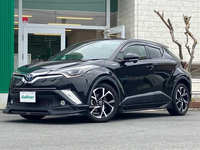 トヨタ Ｃ－ＨＲ G 静岡県 2017(平29)年 4.3万km ブラックマイカ エンジンスタートボタン/保証書/取扱説明書/パワーステアリング/パワーウィンドウ/アイドリングストップ/オートエアコン/スマートキー/クルーズコントロール/ETC2.0/純正SDナビ（CD/DVD/BT/フルセグ）/バックカメラ/ドライブレコーダー前後/純正フロアマット/ハーフレザー/D席N席シートヒーター/TRDエアロ（フロント/サイド/リア）/純正アルミホイール/ABS/横滑り防止装置/コーナーセンサー前後/レーンキープアシスト/オートライト/オートマチックハイビーム/LEDヘッドライト/BSM（ブラインドスポットモニター）/Wプラスサイドエアバック/カーテンエアバック