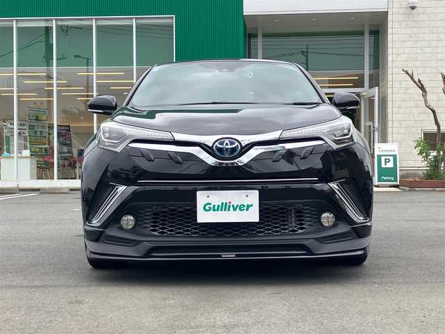 トヨタ Ｃ－ＨＲ G 静岡県 2017(平29)年 4.3万km ブラックマイカ エンジンスタートボタン/保証書/取扱説明書/パワーステアリング/パワーウィンドウ/アイドリングストップ/オートエアコン/スマートキー/クルーズコントロール/ETC2.0/純正SDナビ（CD/DVD/BT/フルセグ）/バックカメラ/ドライブレコーダー前後/純正フロアマット/ハーフレザー/D席N席シートヒーター/TRDエアロ（フロント/サイド/リア）/純正アルミホイール/ABS/横滑り防止装置/コーナーセンサー前後/レーンキープアシスト/オートライト/オートマチックハイビーム/LEDヘッドライト/BSM（ブラインドスポットモニター）/Wプラスサイドエアバック/カーテンエアバック