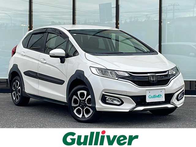 ホンダ フィット 13G L ホンダセンシング 山形県 2017(平29)年 5.8万km プレミアムホワイトパールⅡ ４WD/ホンダセンシング/レーダークルーズコントロール/純正ナビ/（AM/FM/TV/CD/DVD/BT）/バックカメラ/ステアリングスイッチ/レーンキープアシスト/アイドリングストップ/オートLEDヘッドライト/社外15インチAWスタッドレス車載/社外前後ドライブレコーダー/モデューロAW/プッシュスタート/スマートキー/電動格納ミラー/ドアバイザー/横滑り防止装置/ビルトインETC