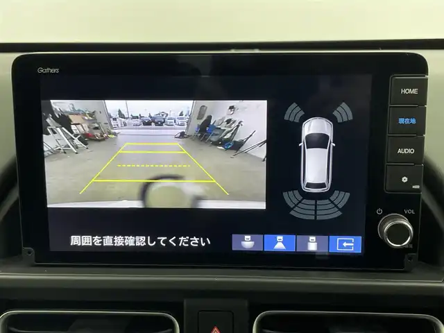 ホンダ フリード ハイブリット e:HEV クロスター 富山県 2025(令7)年 0.1千km プラチナホワイトパール 登録済未使用車/純正9型ナビ（LXM-242ZFNi）/AM/FM/BT/USB/フルセグ/バックカメラ/両側パワースライドドア/ブラインドスポットモニター/衝突被害軽減システム/レーダークルーズコントロール/レーンキープアシスト/コーナーセンサー/横滑り防止装置/オートLEDライト/フォグライト/純正アルミホイール/オートホールド付電子パーキング/革巻きステアリング/ステアリングスイッチ/スマートキー/スペアキー
