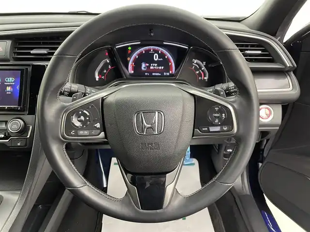 ホンダ シビック ハッチバック 宮城県 2020(令2)年 3.2万km オブシダンブルーパール ホンダセンシング　/ＨＫＳ２本出マフラー　/ブラックエンブレム　/ケンウッドナビＴＶ　/アダプティブクルーズコントロール/革コンビシート　/パワーシート　/ＬＥＤヘッドライト/オートハイビーム/追突軽減ブレーキ〈CMBS〉/路外逸脱抑制機能/ＥＴＣ２．０　/シートヒーター　/禁煙車