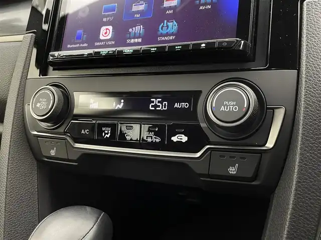 ホンダ シビック ハッチバック 宮城県 2020(令2)年 3.2万km オブシダンブルーパール ホンダセンシング　/ＨＫＳ２本出マフラー　/ブラックエンブレム　/ケンウッドナビＴＶ　/アダプティブクルーズコントロール/革コンビシート　/パワーシート　/ＬＥＤヘッドライト/オートハイビーム/追突軽減ブレーキ〈CMBS〉/路外逸脱抑制機能/ＥＴＣ２．０　/シートヒーター　/禁煙車