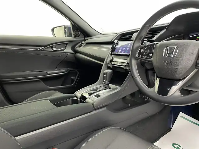 ホンダ シビック ハッチバック 宮城県 2020(令2)年 3.2万km オブシダンブルーパール ホンダセンシング　/ＨＫＳ２本出マフラー　/ブラックエンブレム　/ケンウッドナビＴＶ　/アダプティブクルーズコントロール/革コンビシート　/パワーシート　/ＬＥＤヘッドライト/オートハイビーム/追突軽減ブレーキ〈CMBS〉/路外逸脱抑制機能/ＥＴＣ２．０　/シートヒーター　/禁煙車