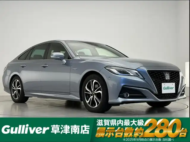 トヨタ クラウン ハイブリッド S Cパッケージ 滋賀県 2019(平31)年 2.1万km プレシャスガレナ 純正ナビ/【Bluetooth/フルセグTV/CD/DVD】/パノラミックビューモニター/パーキングアシスト/パーキングサポートブレーキ/ヘッドアップディスプレイ/ETC2.0/前後ドラレコ/トヨタセーフティセンス/・プリクラッシュセーフティ/・レーントレーシングアシスト/・レーダークルーズコントロール/・オートマチックハイビーム/・ロードサインアシスト/・先行車発進告知機能/ブラインドスポットモニター/リアクロストラフィックオートブレーキ/リアクロストラフィックアラート/パワーシート/シートヒーター/ステアリングヒーター/LEDヘッドライト/パドルシフト/純正アルミ積込（サマータイヤ付き）