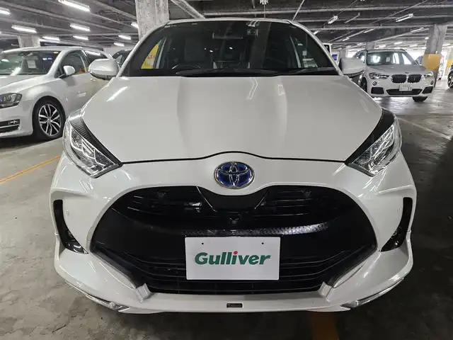 トヨタ ヤリス ハイブリッド Z 福岡県 2020(令2)年 7.9万km ホワイトパールクリスタルシャイン モデリスタエアロ(F/S/R)/モデリスタ15インチアルミホイール/パノラミックビューモニター/純正8型ディスプレイオーディオ/ビルトインETC/前後ドライブレコーダー/レーダークルーズコントロール/クリアランスソナー/セーフティセンス/・衝突被害軽減ブレーキ/・車線逸脱防止支援システム/・オートマチックハイビーム/・標識認識機能/・セカンダリーコリジョンブレーキ/フルLEDヘッドランプ/革巻きステアリング/上級ファブリックシート/前席シートヒーター/スマートキー/プッシュエンジンスタート/禁煙車
