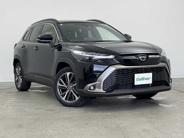 トヨタ カローラ クロス ハイブリッド Z 新潟県 2024(令6)年 0.1万km未満 アティチュードブラックマイカ 純正10.5インチディスプレイオーディオ(ナビ フルセグTV)/パノラマルーフ/パノラマミックビューモニター/置くだけ充電/前後コーナーセンサー/LEDヘッドライト/ルーフレール/ステアリングヒーター/純正フロアマット/純正ドライブレコーダー/純正ビルトインETC2.0/スマートキー/ハーフレザーシート/パーキングサポートブレーキ/ブラインドスポットモニター/アドバンストパーク/パワーバックドア/100V充電/D席パワーシート/18インチ純正アルミホイール