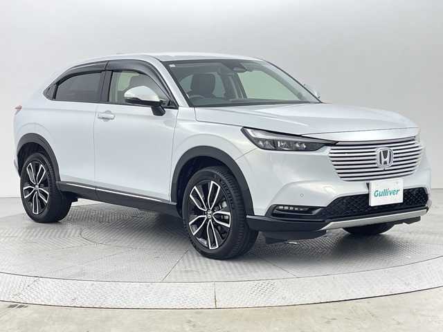 ホンダ ヴェゼル ハイブリッド e:HEV Z 新潟県 2023(令5)年 0.9万km プレミアムサンライトホワイトパール ４WD/ホンダセンシング/ワンオーナー/禁煙車/ホンダコネクトディスプレイ/　　AM/FM/BT/フルセグ/applecarplay/androidauto/マルチビューモニター/ハンズフリーアクセスパワーバックドア(予約クローズ付)/アダプティブクルーズコントロール/LEDシーケンシャルターンランプ/前席シートヒーター/純正18インチアルミホイール付/ダウンヒルアシストコントロール/電動パーキングブレーキ/オートブレーキホールド/ミラーヒーター/ステアリングスイッチ/ステアリングヒーター/USBポート/純正ドライブレコーダー/ブラインドスポットモニター/エンジンスタータ/スマートキー/ETC2.0